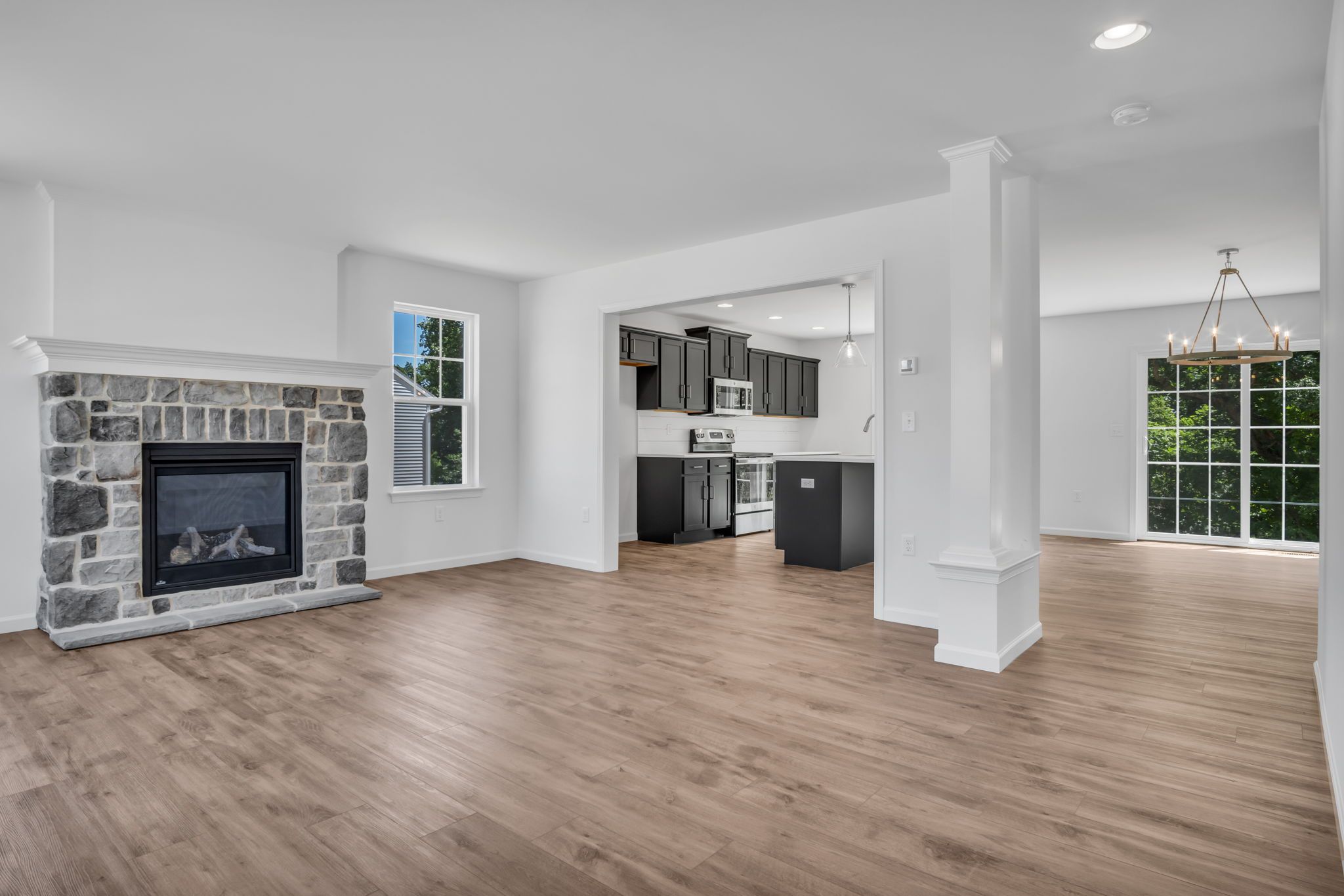 Living room with fireplace of the Charlotte Model from Garman Builders