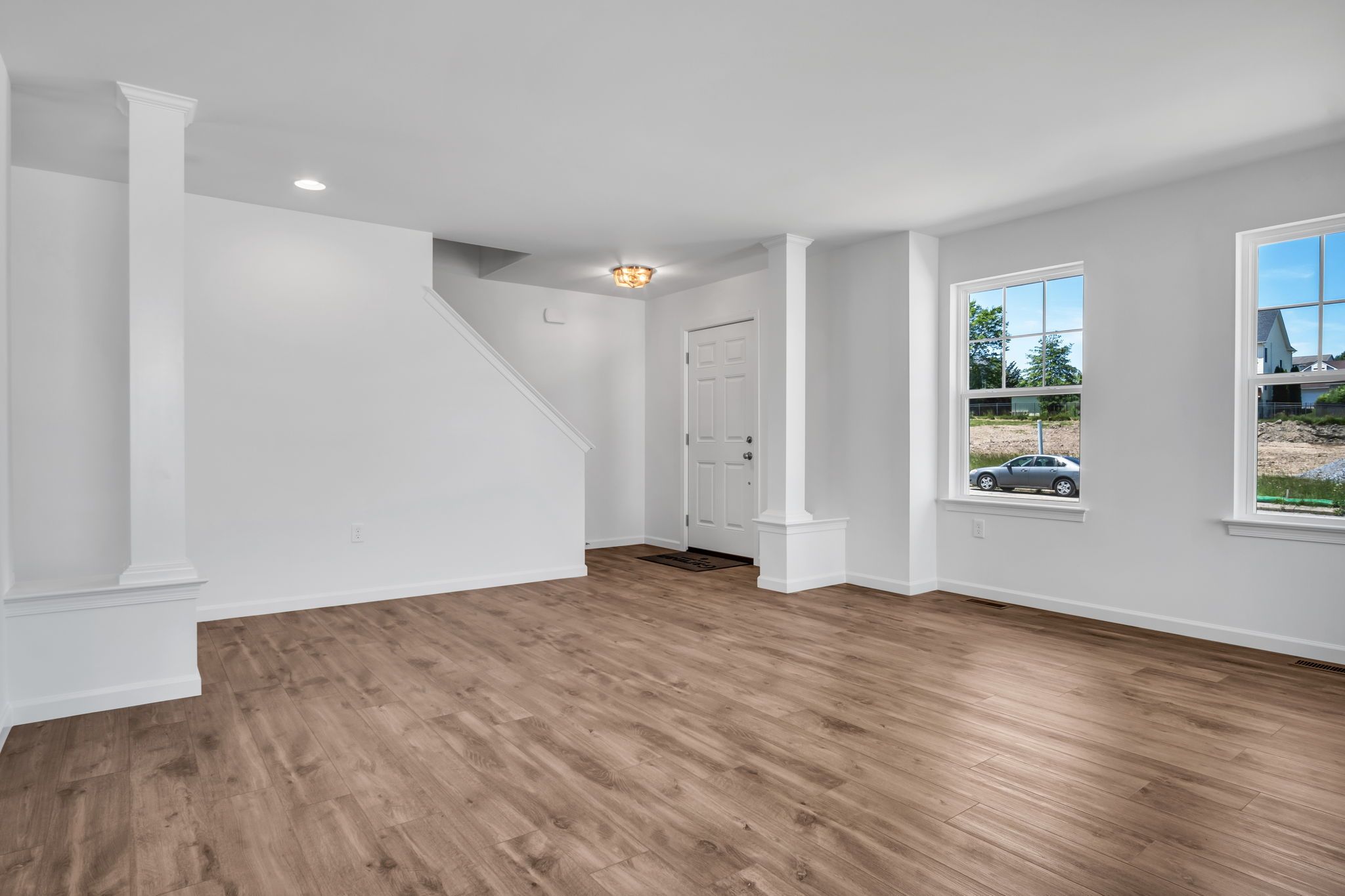 Living room with fireplace of the Charlotte Model from Garman Builders
