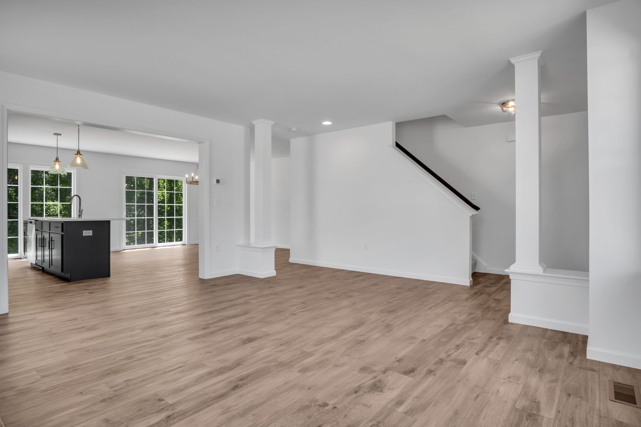 Kitchen with center island of the Charlotte Model from Garman Builders