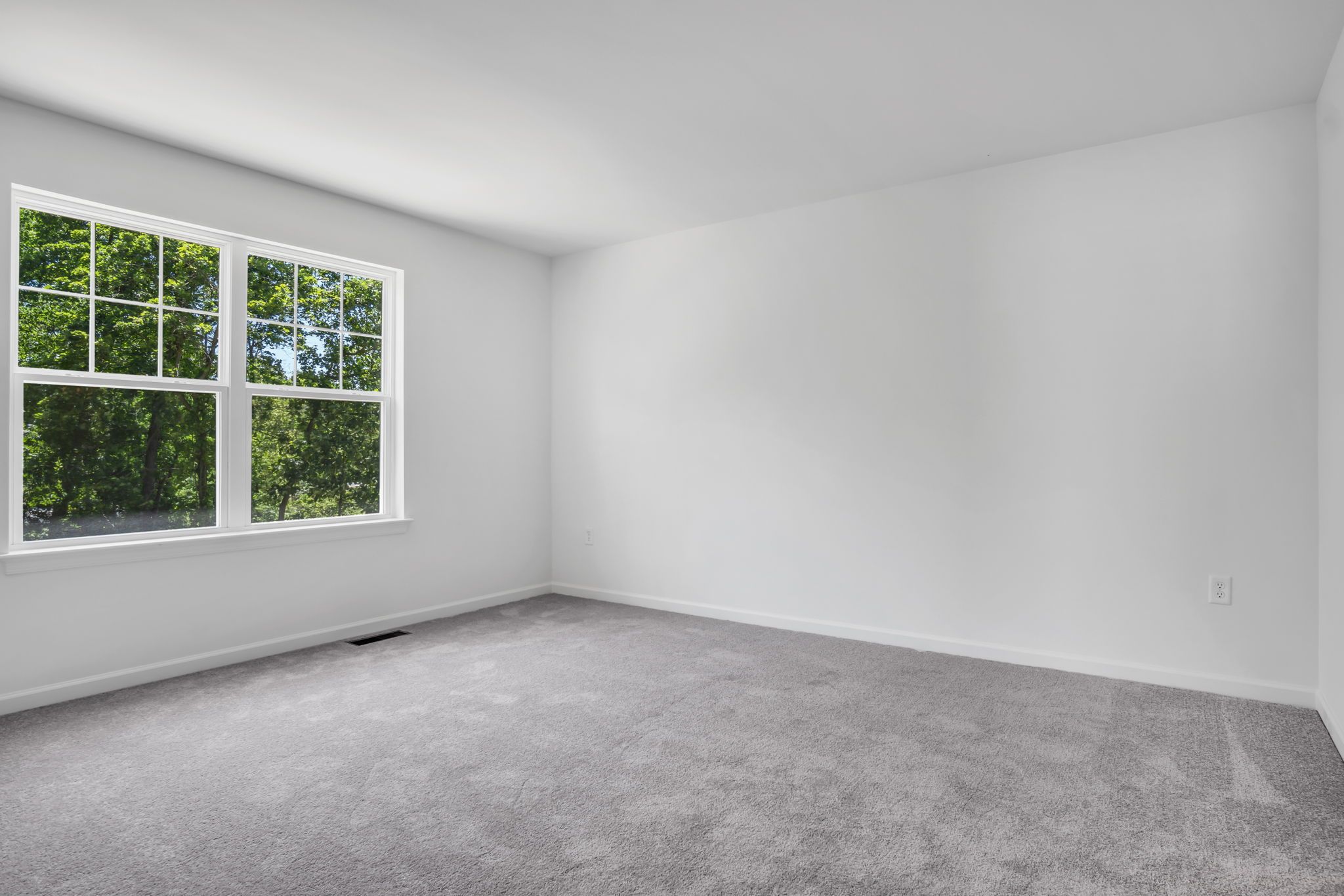 Bedroom of the Charlotte Model from Garman Builders