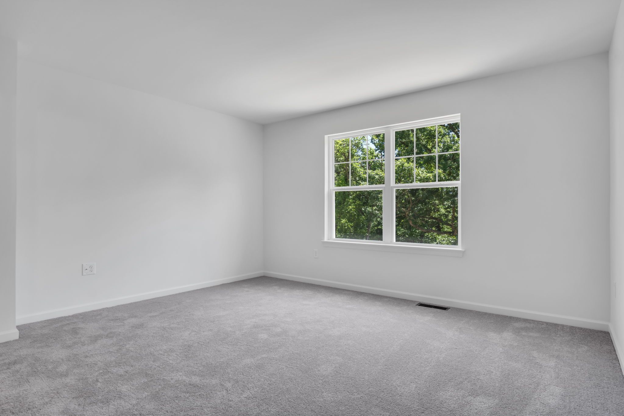 Bedroom of the Charlotte Model from Garman Builders