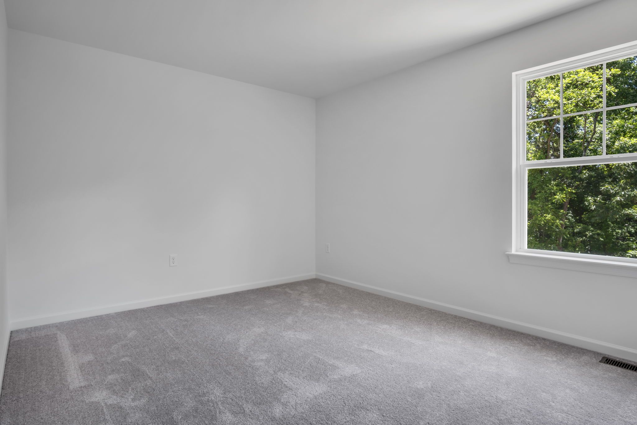 Bedroom of the Charlotte Model from Garman Builders