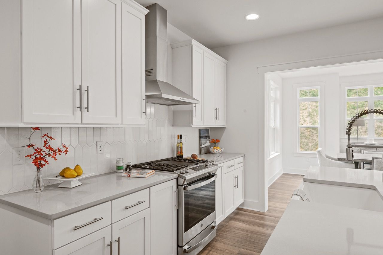 Kitchen with Center Island of the Leighton Model from Garman Builders