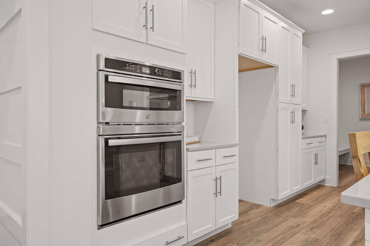 Kitchen with Center Island of the Leighton Model from Garman Builders