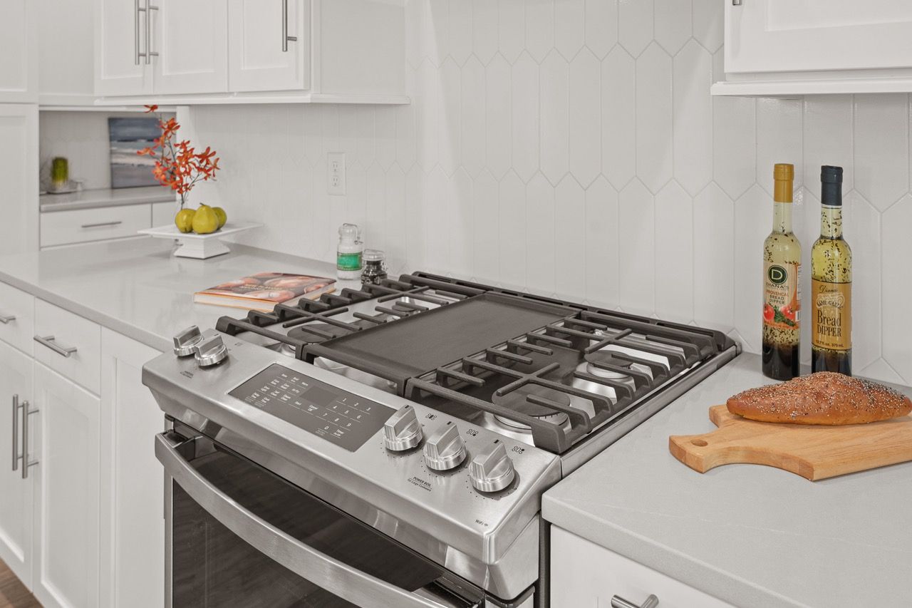 Kitchen with Center Island of the Leighton Model from Garman Builders