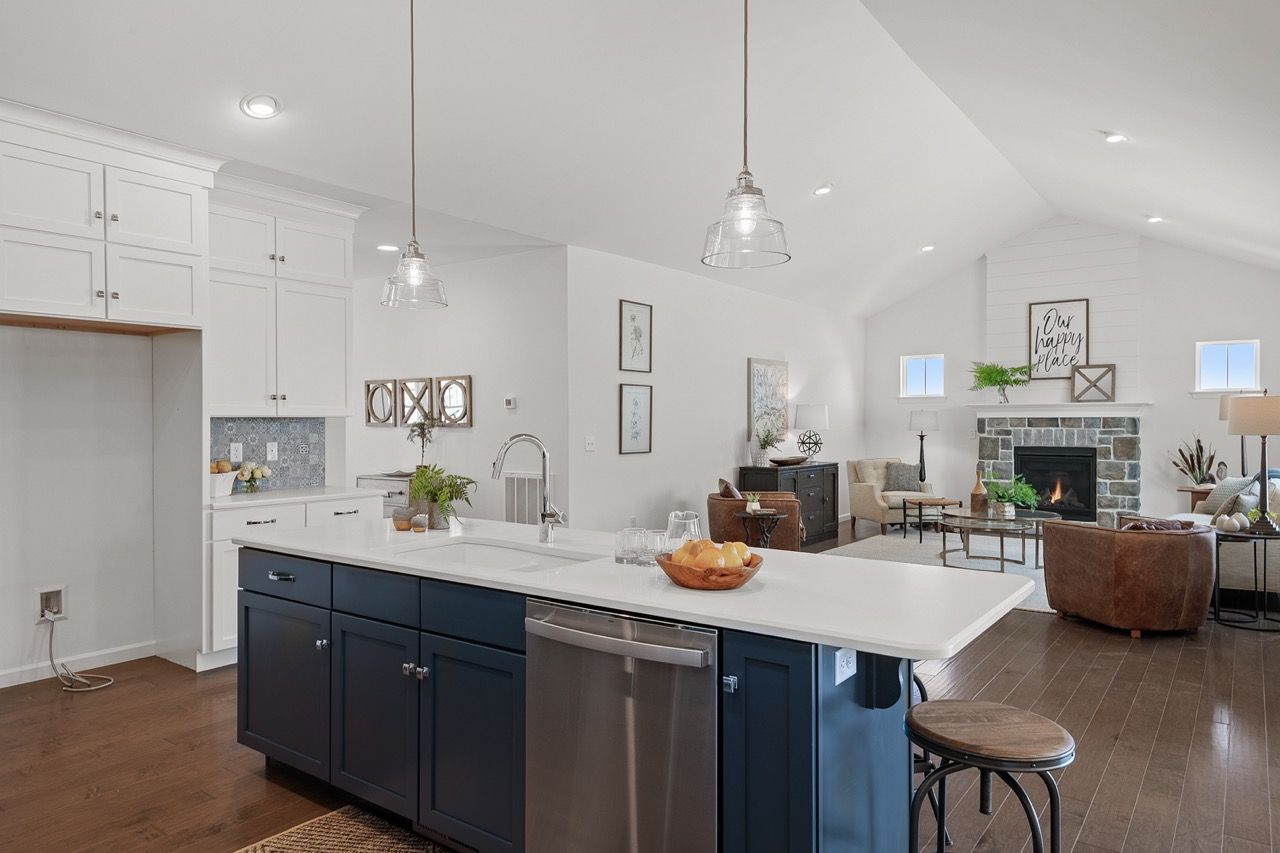 Kitchen with white cabinets of the Blakely model from Garman Builders