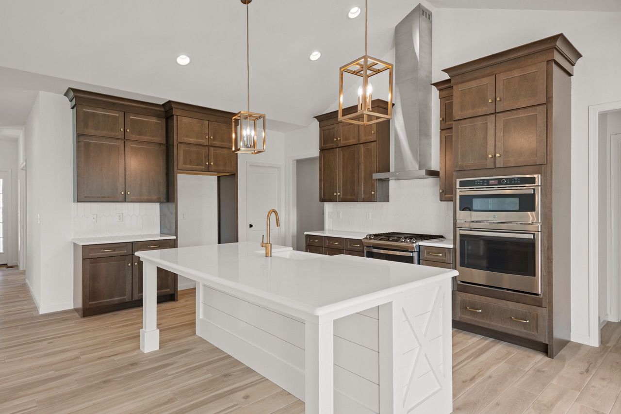 Kitchen with center island of the Blakely model from Garman Builders