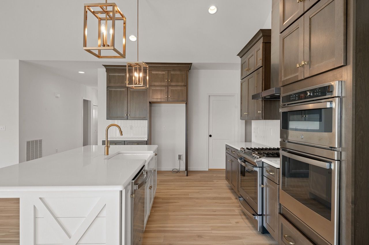 Kitchen with center island of the Blakely model from Garman Builders