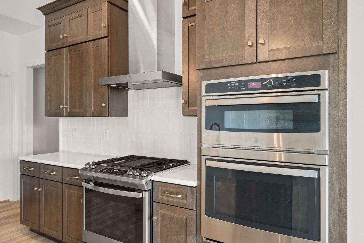 Kitchen with center island of the Blakely model from Garman Builders