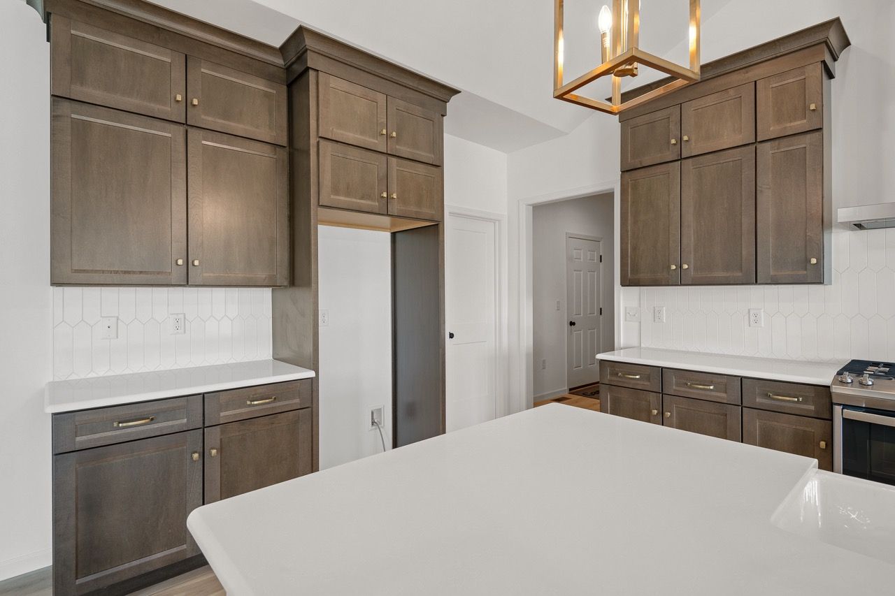 Kitchen with center island of the Blakely model from Garman Builders