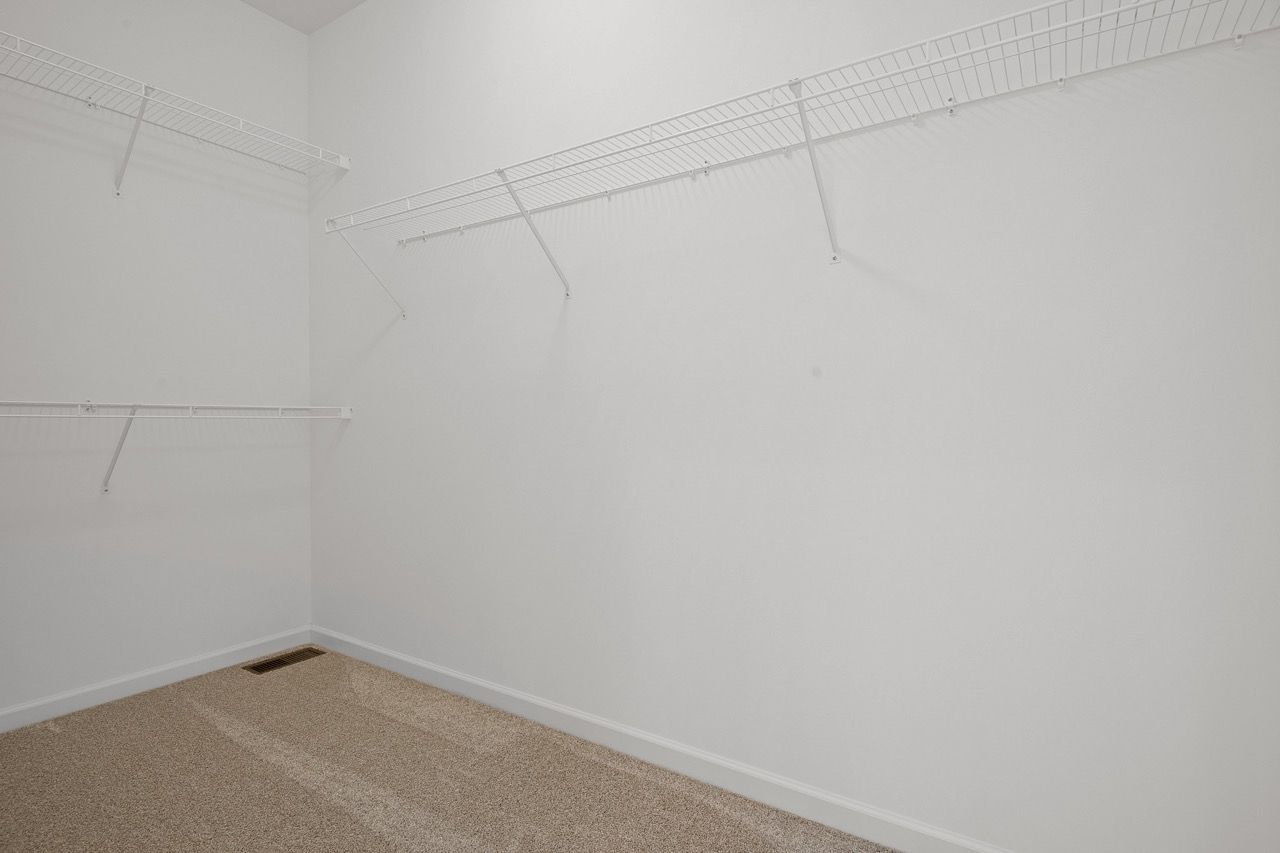 Walk in closet of the Blakely model from Garman Builders