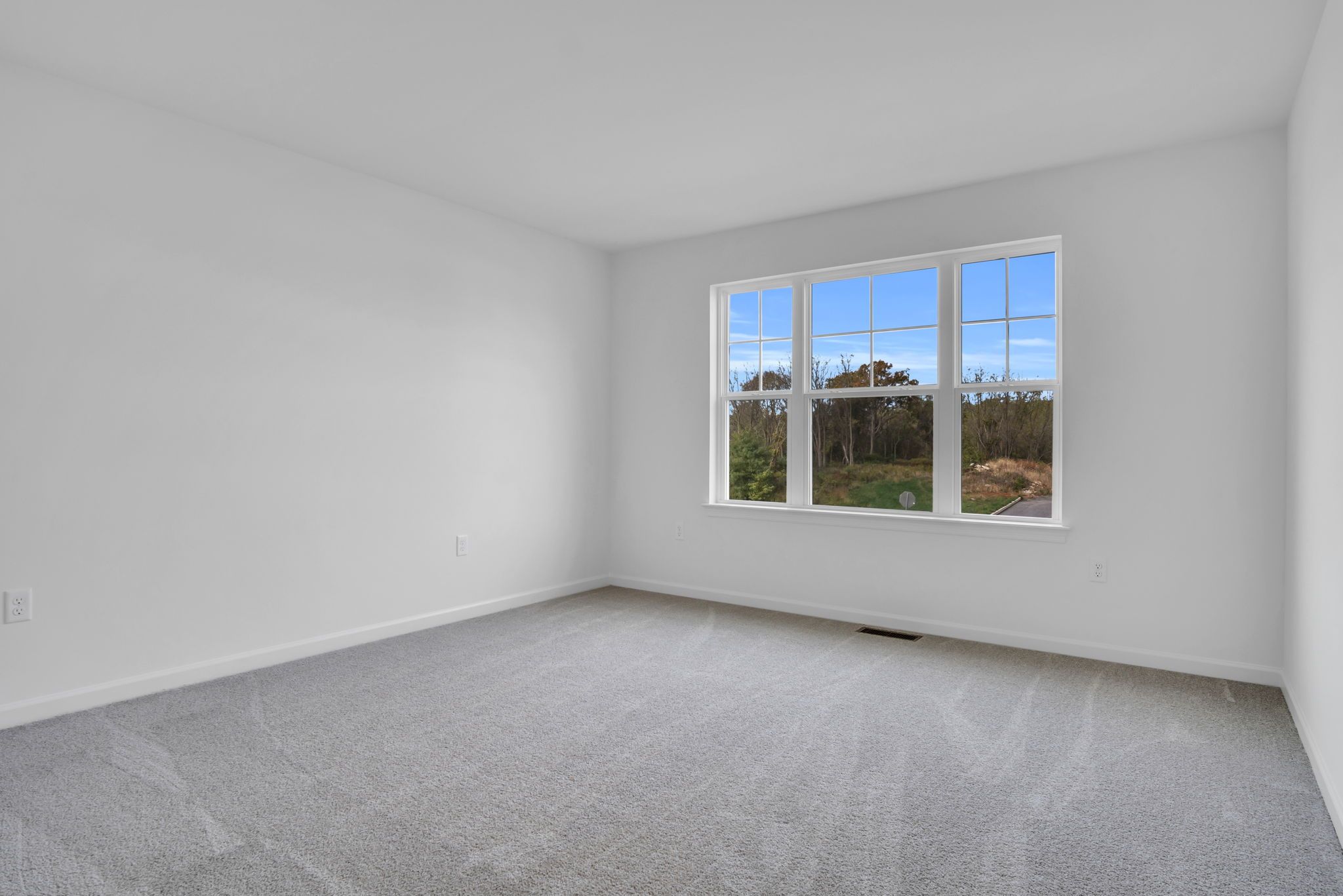 Empty Bedroom of the Everett Model from Garman Builders