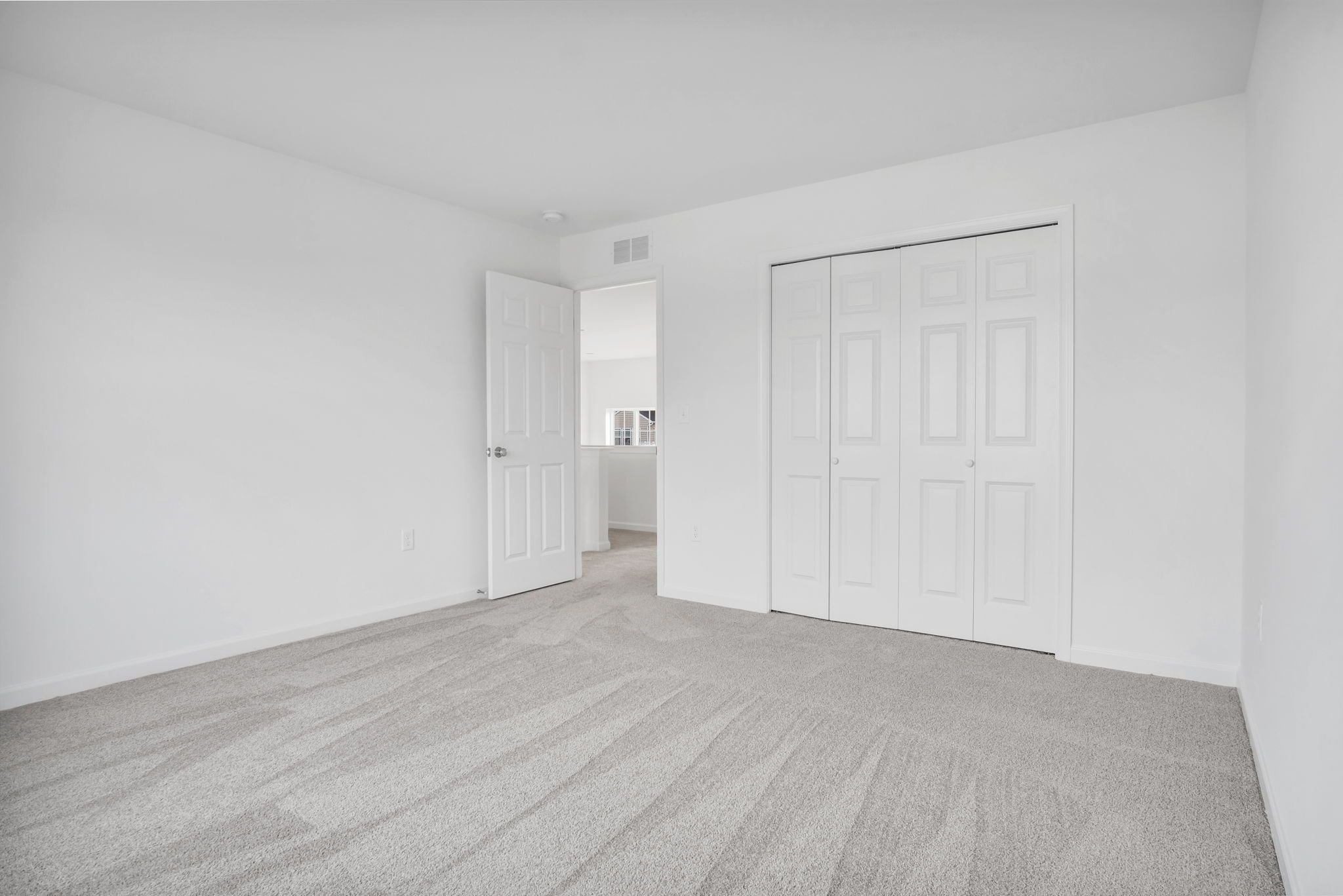 Empty Bedroom of the Everett Model from Garman Builders