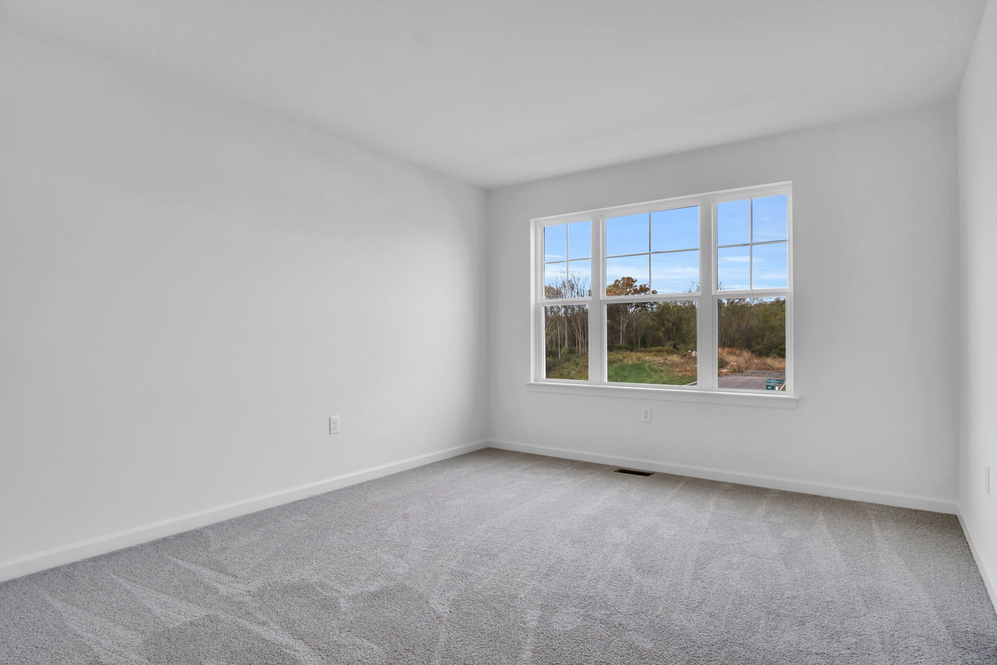 Empty Bedroom of the Everett Model from Garman Builders
