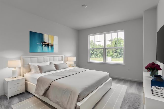 Bedroom of a Home in Mayapple Woods Townhome Community from Garman Builders