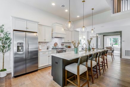 Kitchen with white cabinets in a home at Wynfield at Millersville
