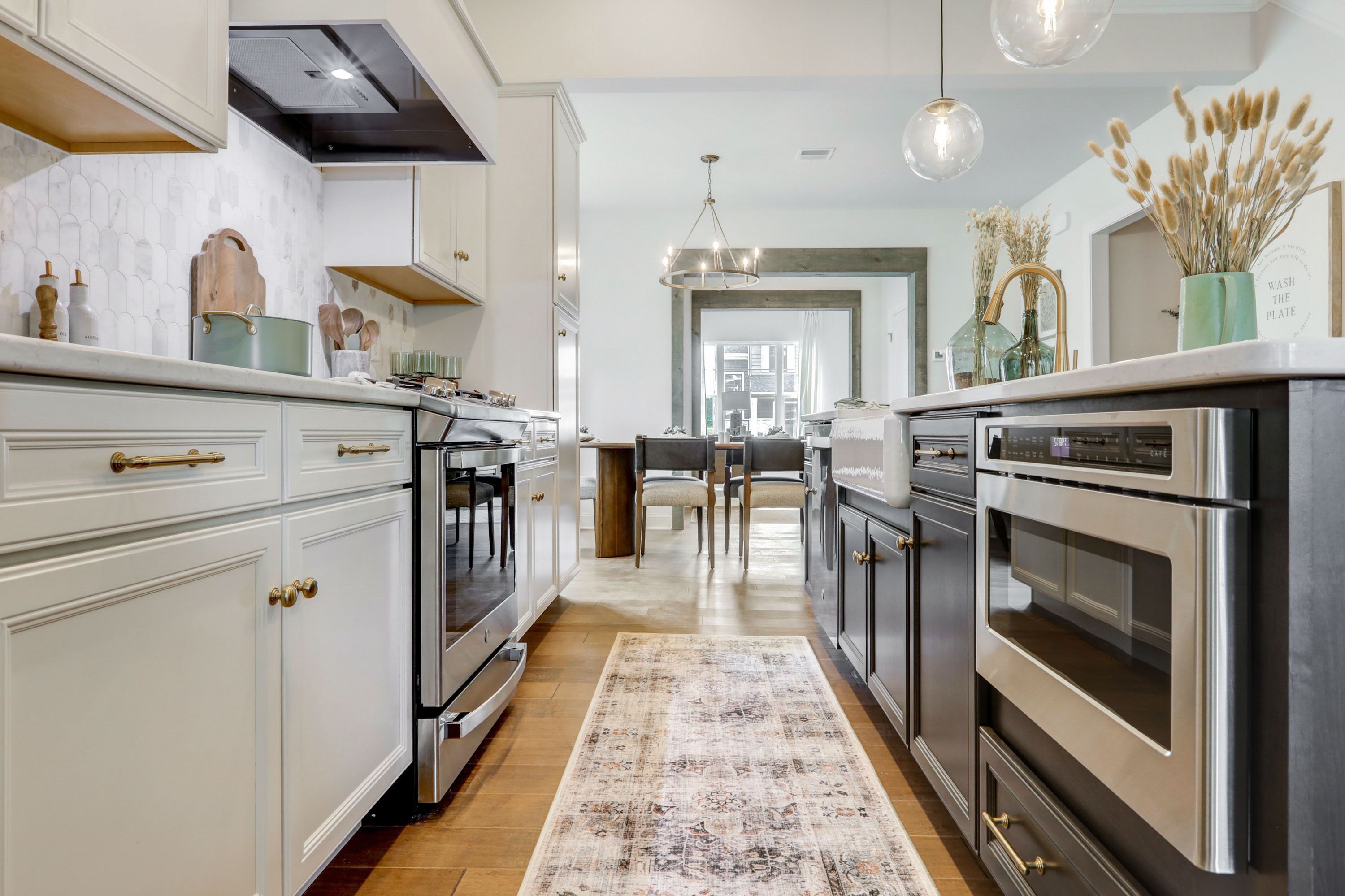 Kitchen with white cabinets in a home at Wynfield at Millersville