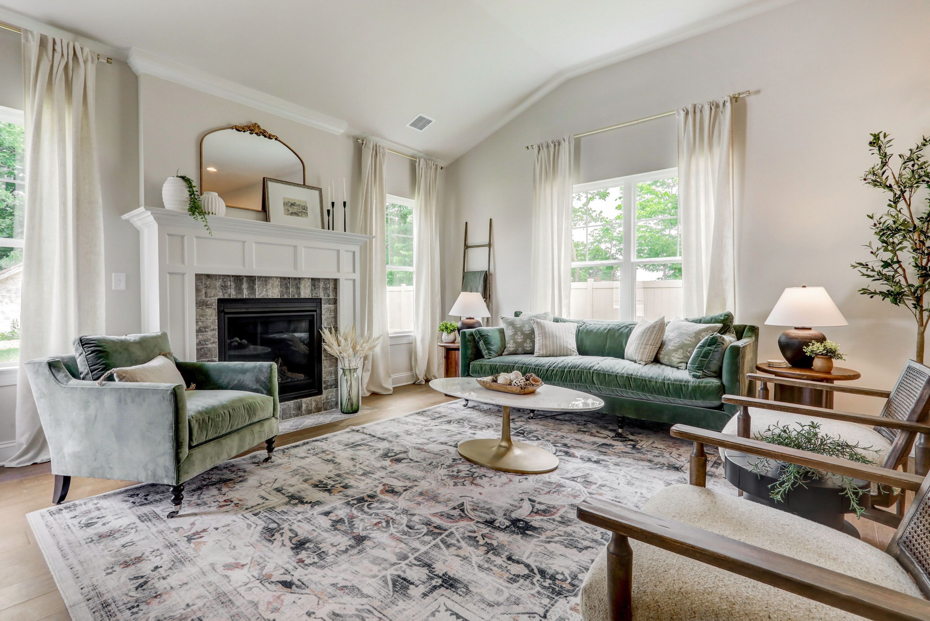 Living room with fireplace in a home at Wynfield at Millersville