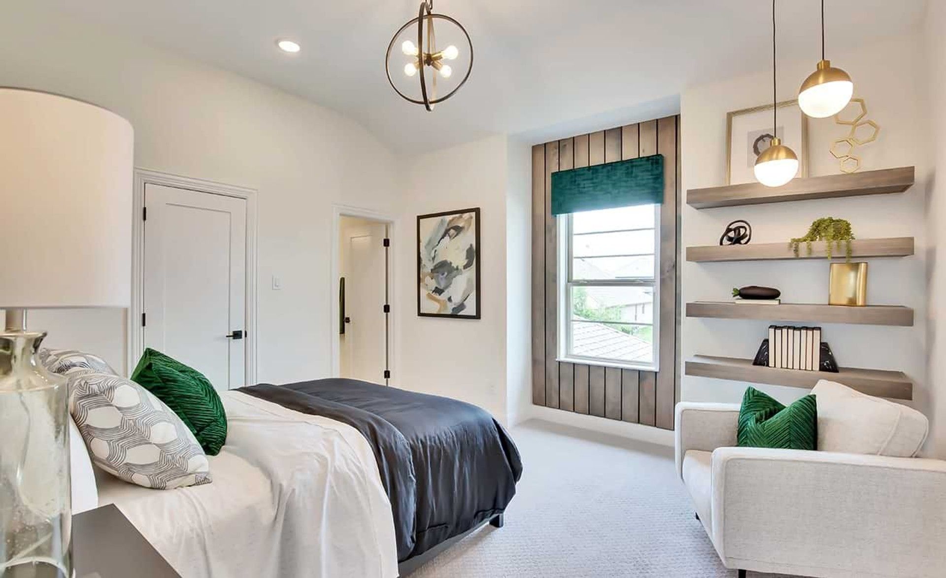 Experience refined living with chic lighting and custom shelving at Oaks at San Gabriel.