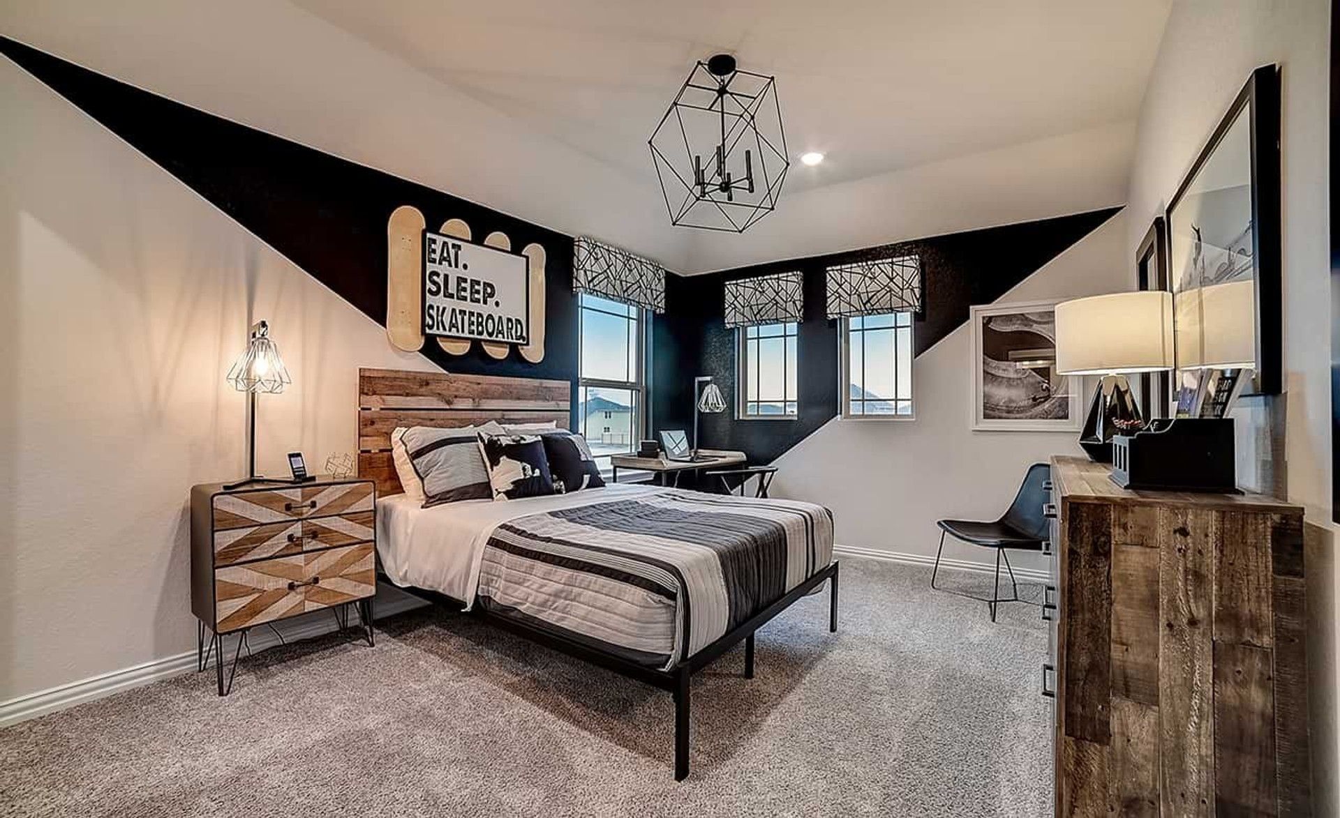 Elegant geometric chandelier and rustic wood elements define this stylish Dauer Ranch bedroom.