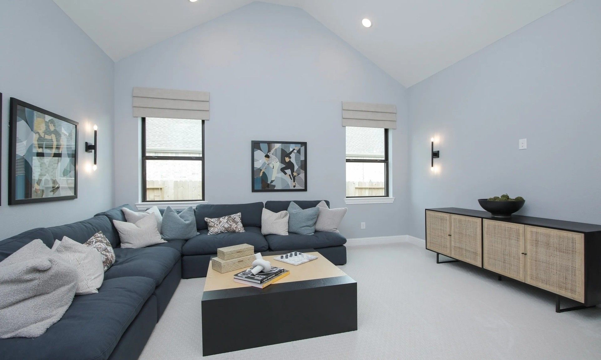 Sophisticated vaulted ceilings and bespoke furnishings define this exquisite Coastal Point living area.