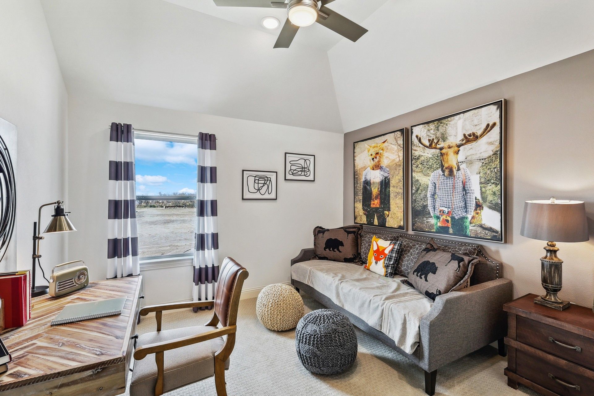 Experience refined elegance with bespoke furnishings and vibrant art in a Solterra Texas study.