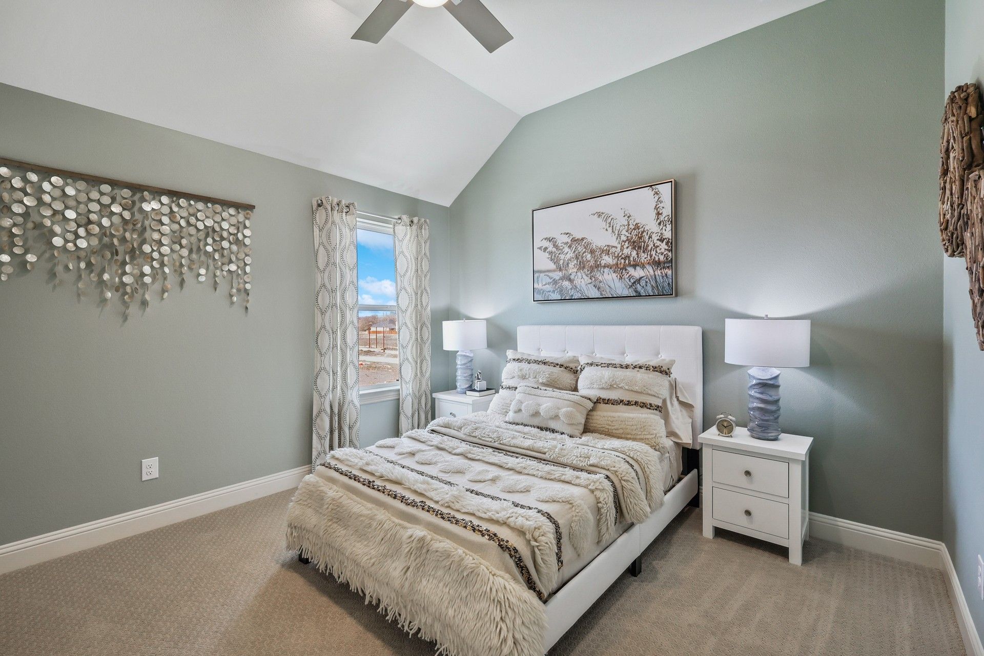 Experience luxury with vaulted ceilings, plush textures, and tasteful decor in Solterra, Texas.