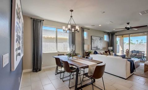 Sophisticated chandelier and spacious layout in Castillo at Anderson Parc, Arizona.