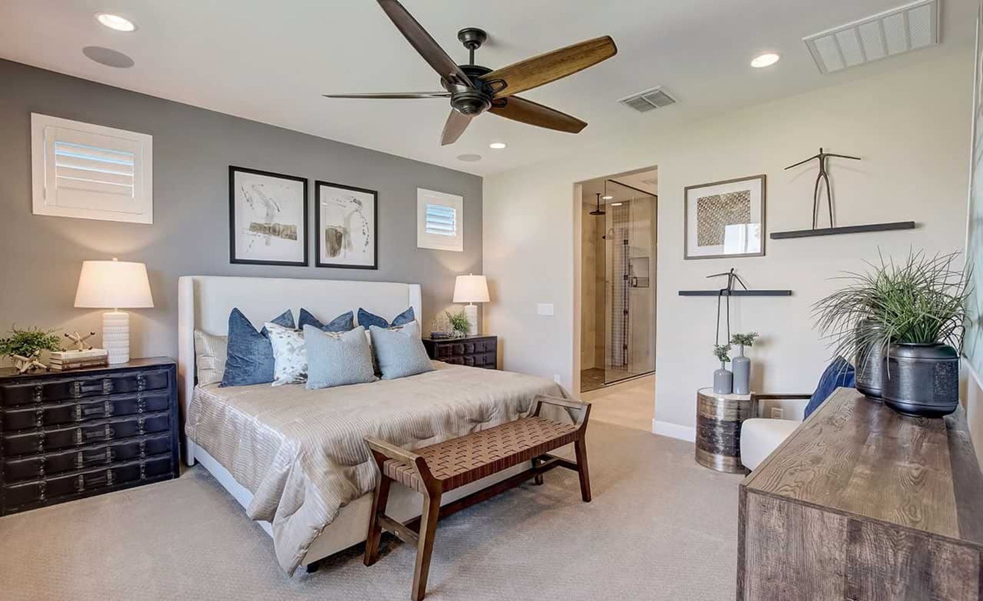 Discover refined elegance with a sleek ceiling fan and artful modern accents in Anderson Parc, Arizona.
