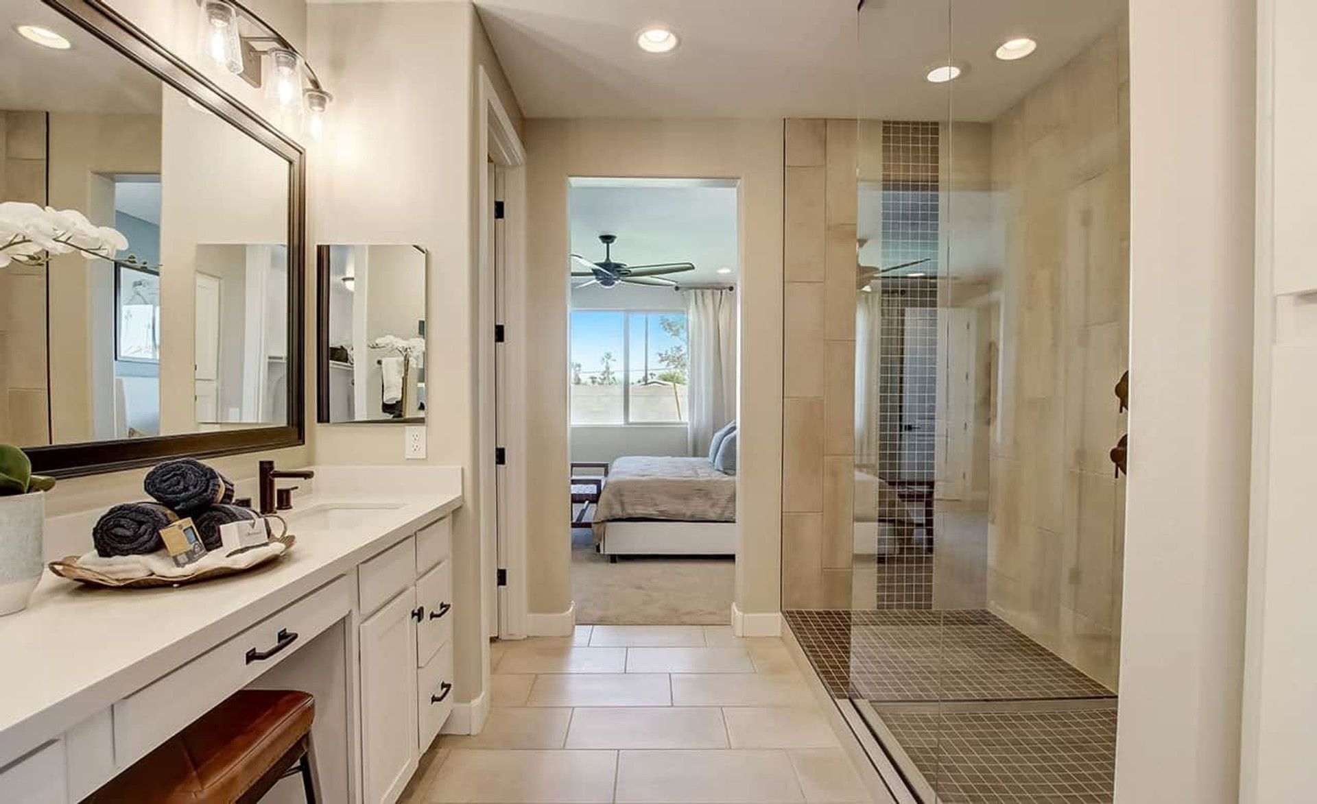 Experience refined elegance with a spacious glass shower and sleek vanity in Anderson Parc.