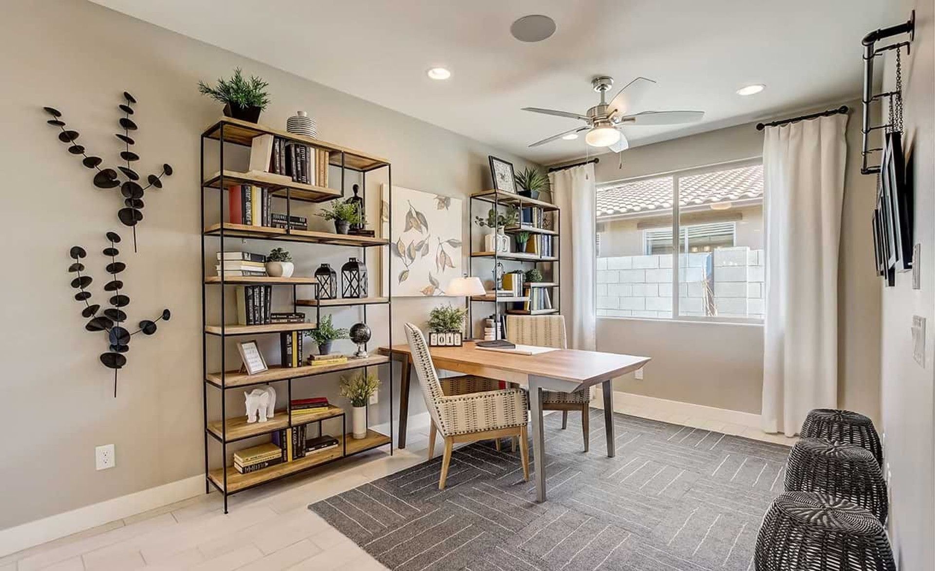 Elegant shelving and abundant natural light define this sophisticated Anderson Parc office.
