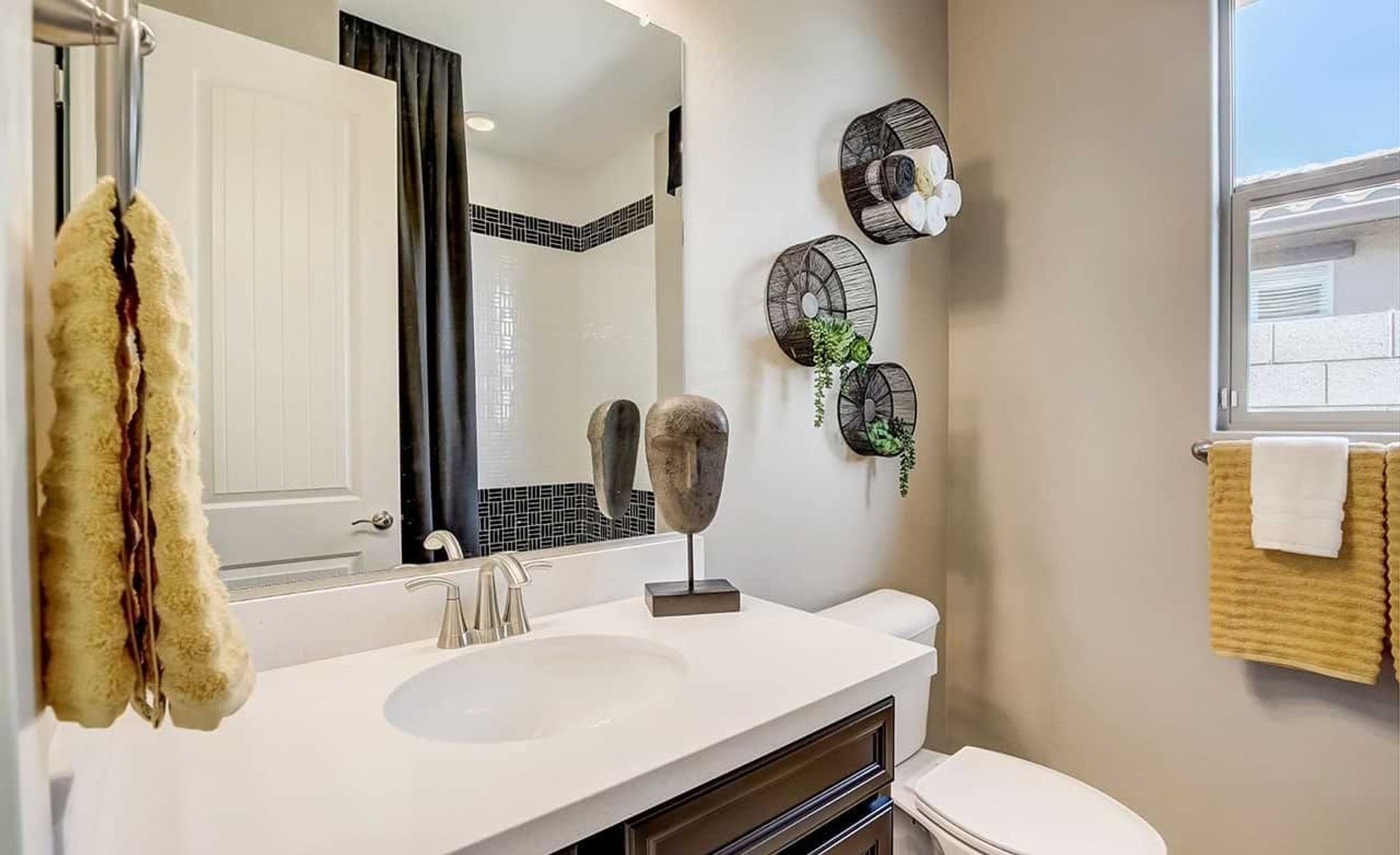 Experience luxury with a sleek white countertop and contemporary artistic details at Anderson Parc.