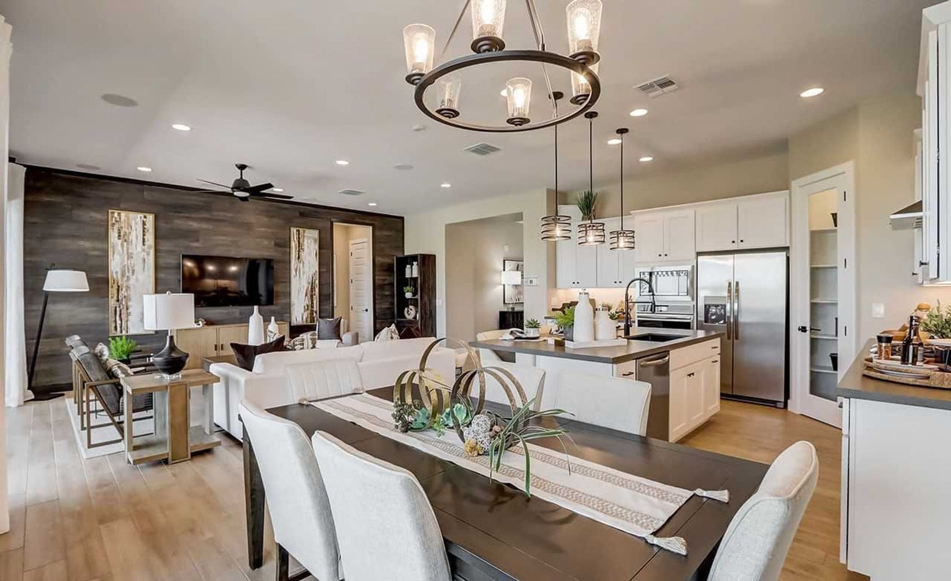 Elegant lighting and sleek finishes in Canyon Views' open-plan design showcase upscale living.