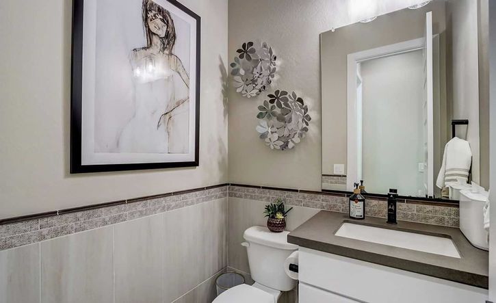 Chic powder room with bespoke fixtures and contemporary art, Canyon Views - Hacienda community.