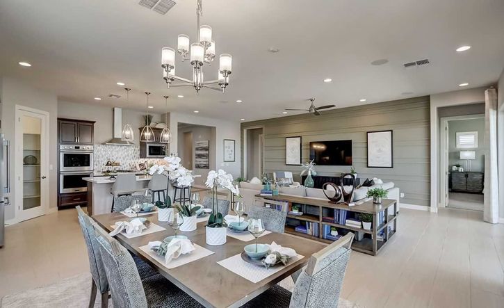 Experience elegance with sleek cabinetry, refined lighting, and sophisticated design in Hacienda community.
