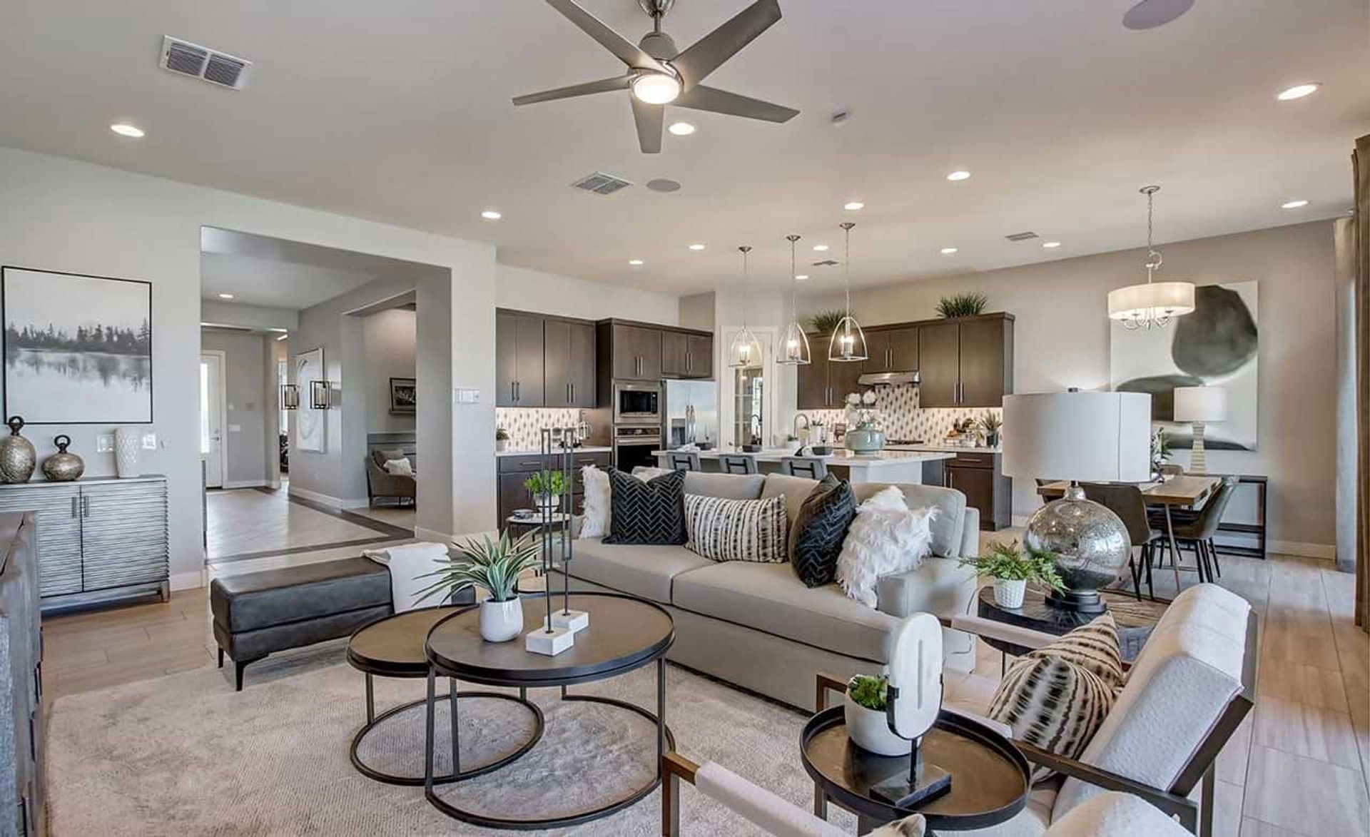 Discover open-concept elegance with sleek cabinetry, chic lighting, and curated decor at Mirada Crossing.