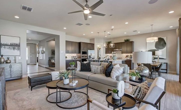 Discover open-concept elegance with sleek cabinetry, chic lighting, and curated decor at Mirada Crossing.