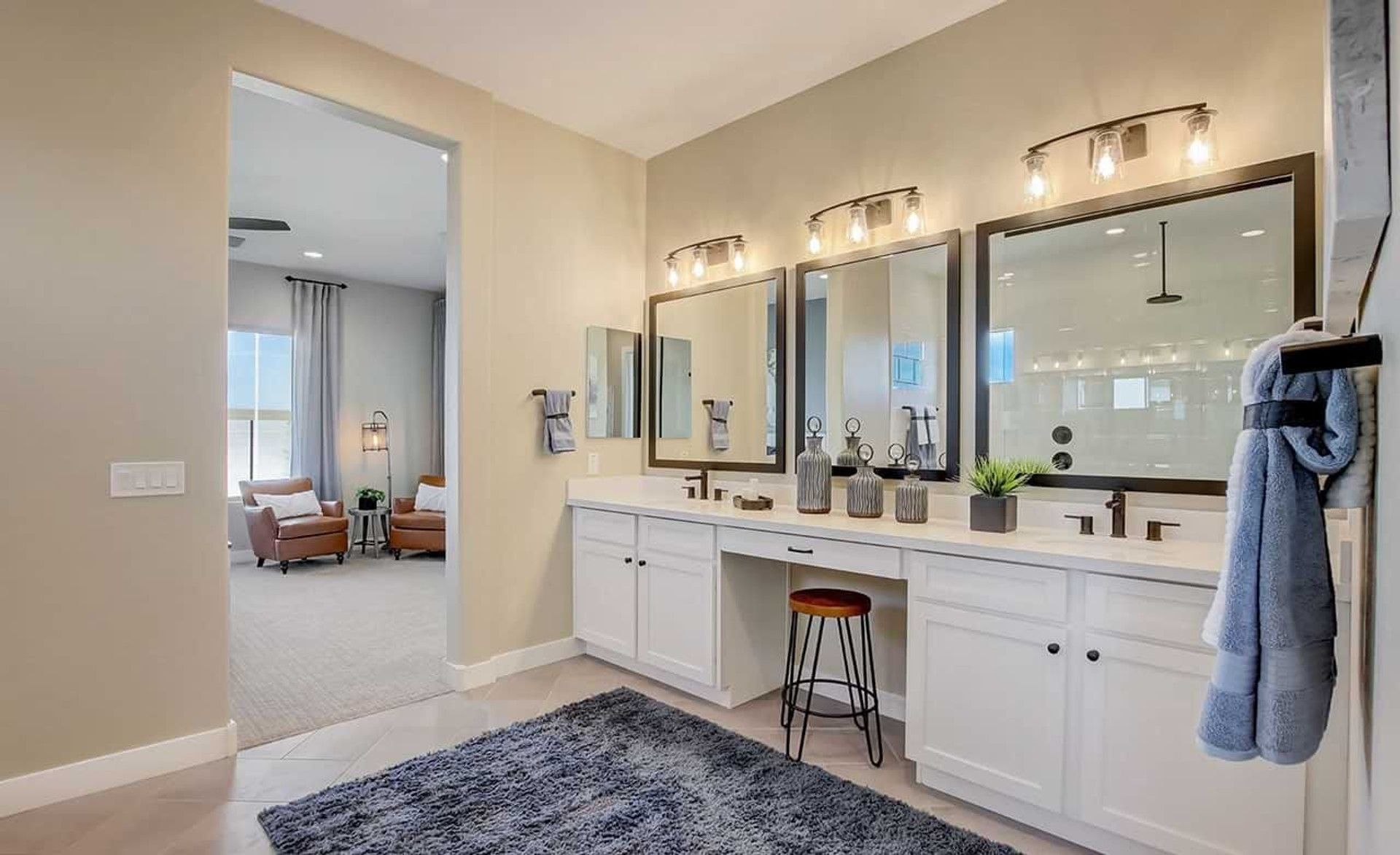 Experience refined elegance with a spacious double vanity, chic lighting, in Mirada Crossing.