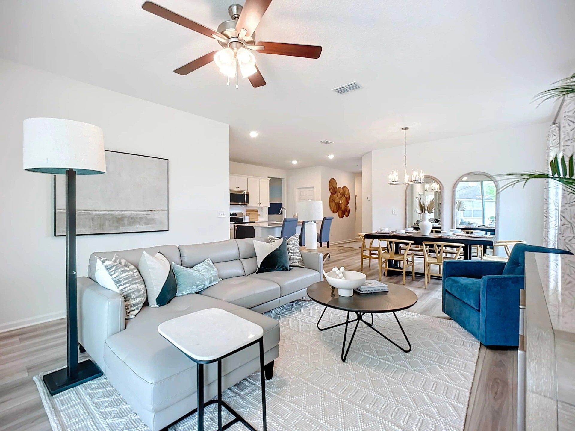 Luxurious open-plan layout with chic decor and ceiling fan, Panther Creek, Jacksonville.