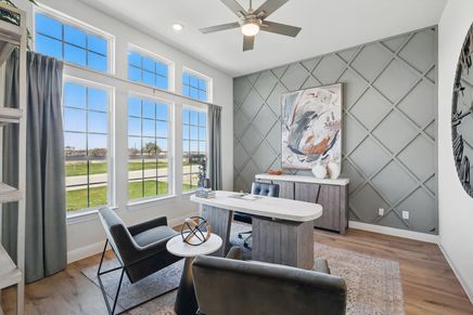 Experience elegance with expansive windows and a diamond-crafted accent wall, Rio Vista at Kelly Ranch.