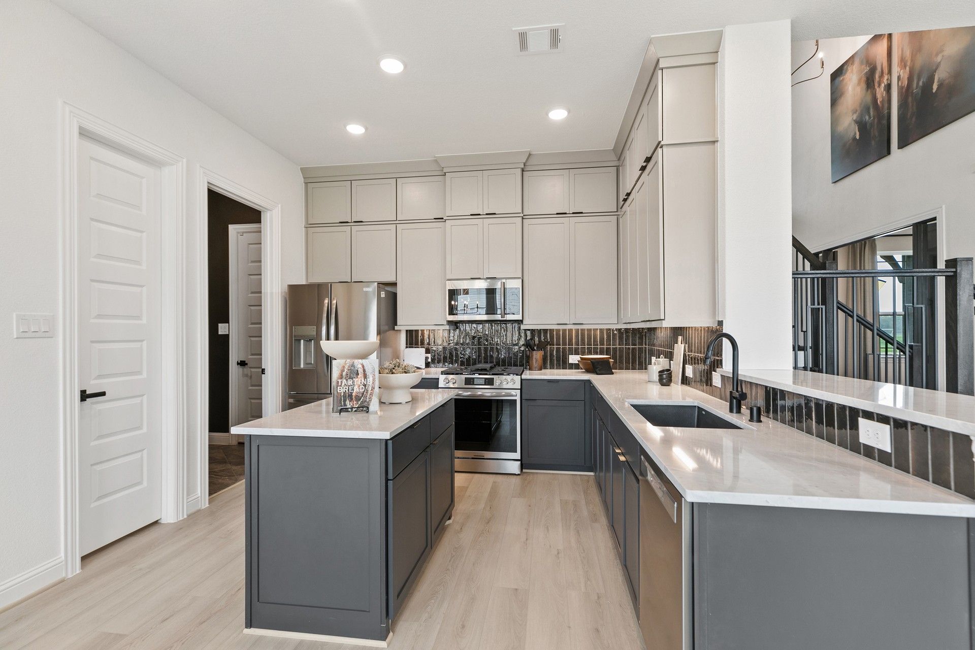 Experience luxury with elegant cabinetry and exquisite marble countertops in Park at Eldridge, Houston.