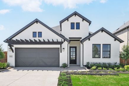 Elegant gabled facade with striking black accents in Green Oaks Preserve.