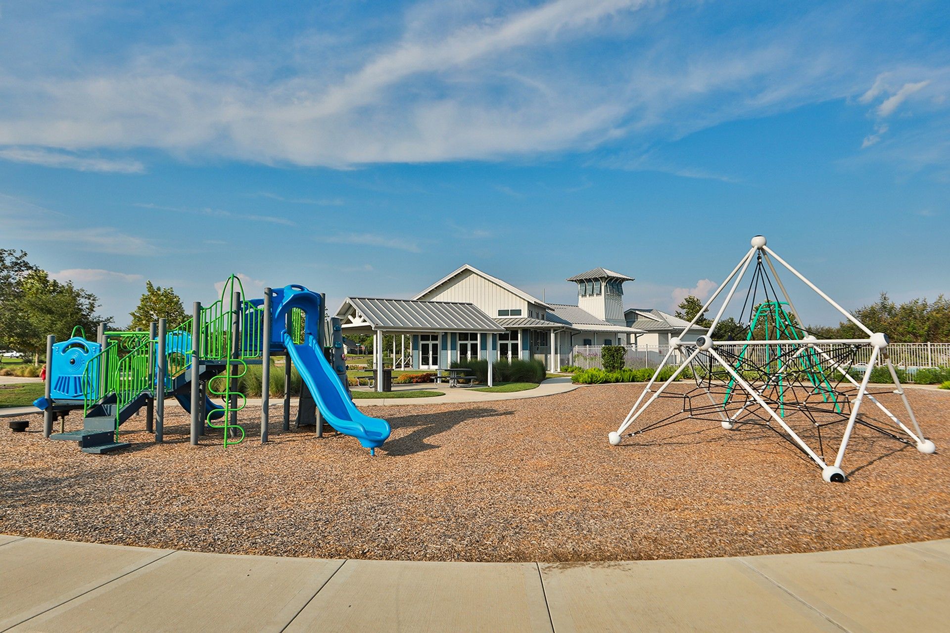 Modern clubhouse and vibrant playground in League City’s Coastal Point community.