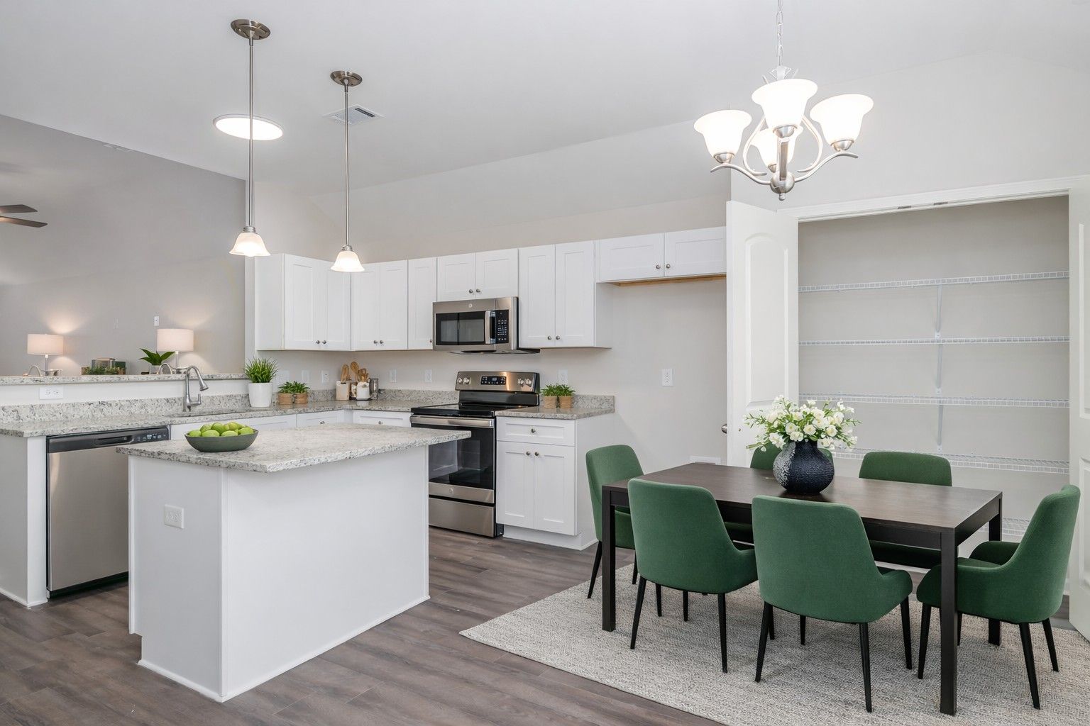 Staged Kitchen and Eat in Dining