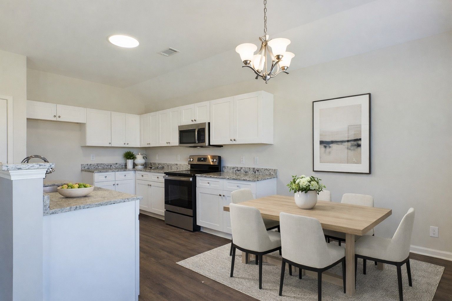 Staged Kitchen and Eat in Dining
