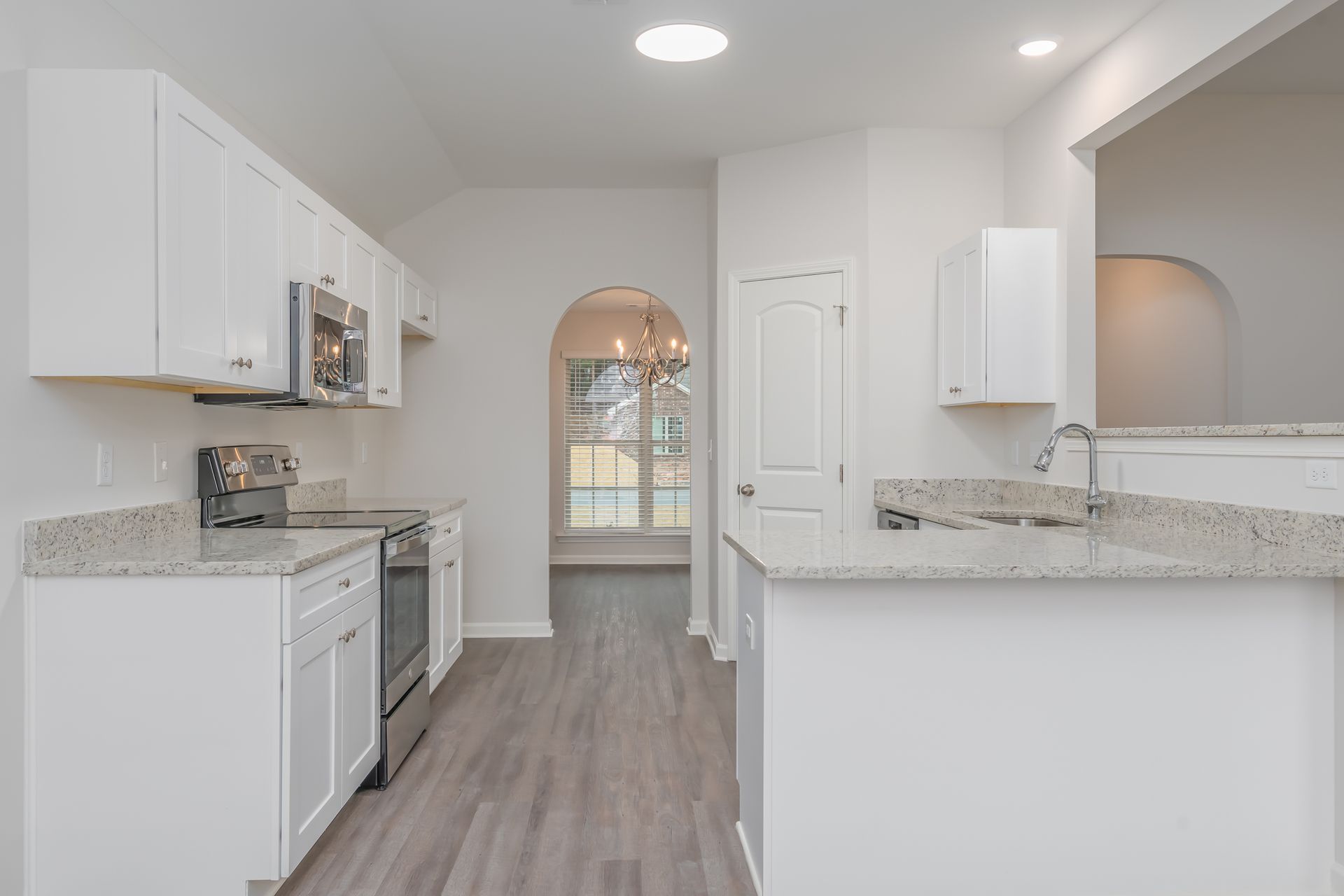 Kitchen with Dining Room and Penisula View