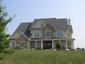 casa en Grand Construction & Management, Inc. por Grand Construction & Management, Inc.