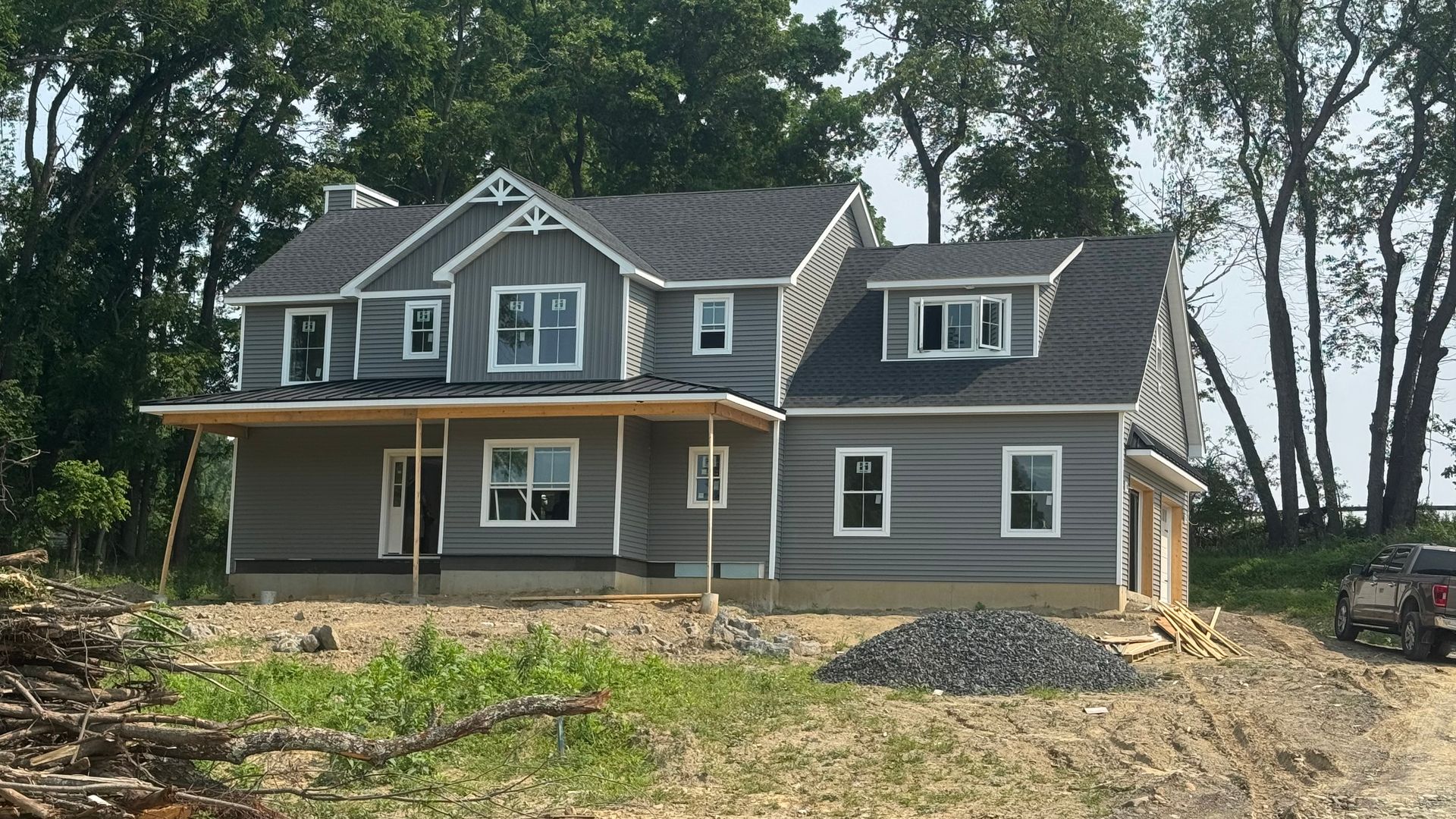 Construction Progress Photo of Bella Exterior Preparing for Porch Installation.