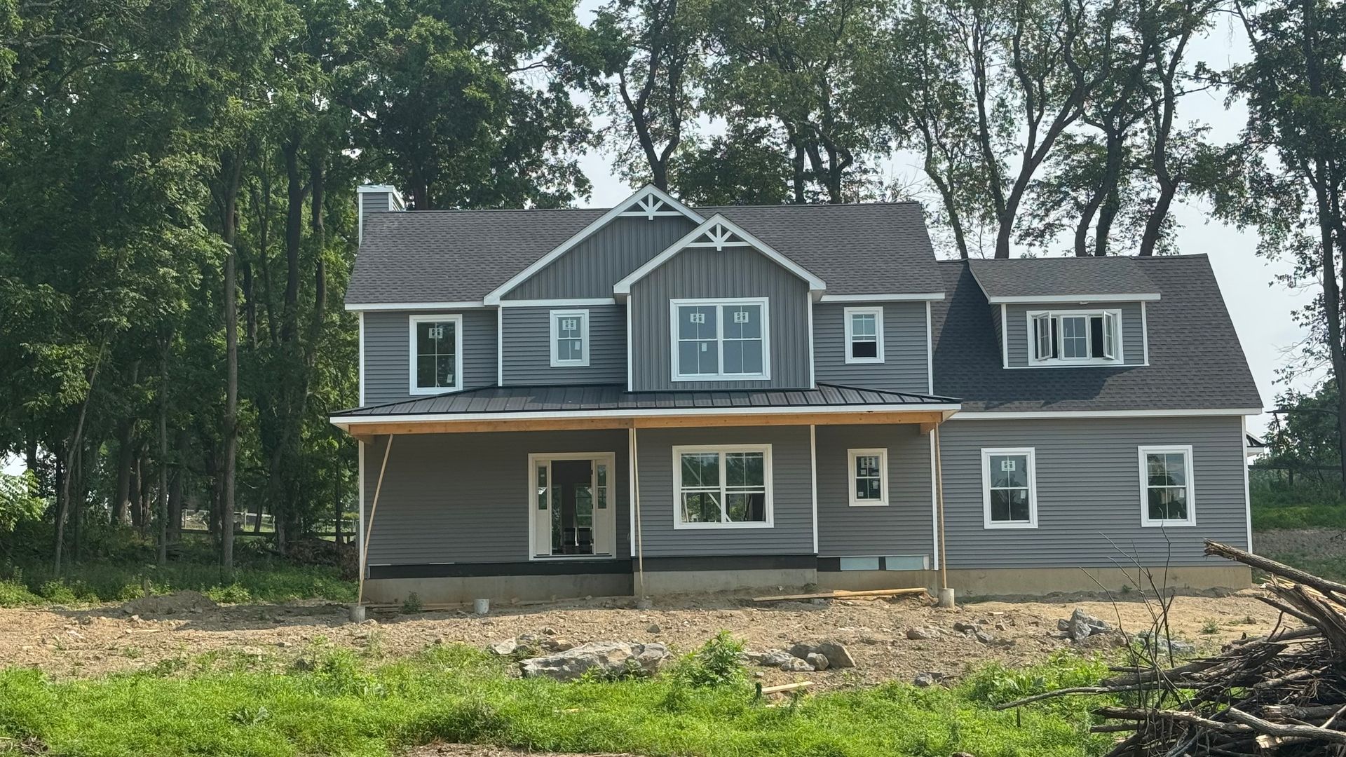 Construction Progress Photo of Site Preparation for Front Porch Installation