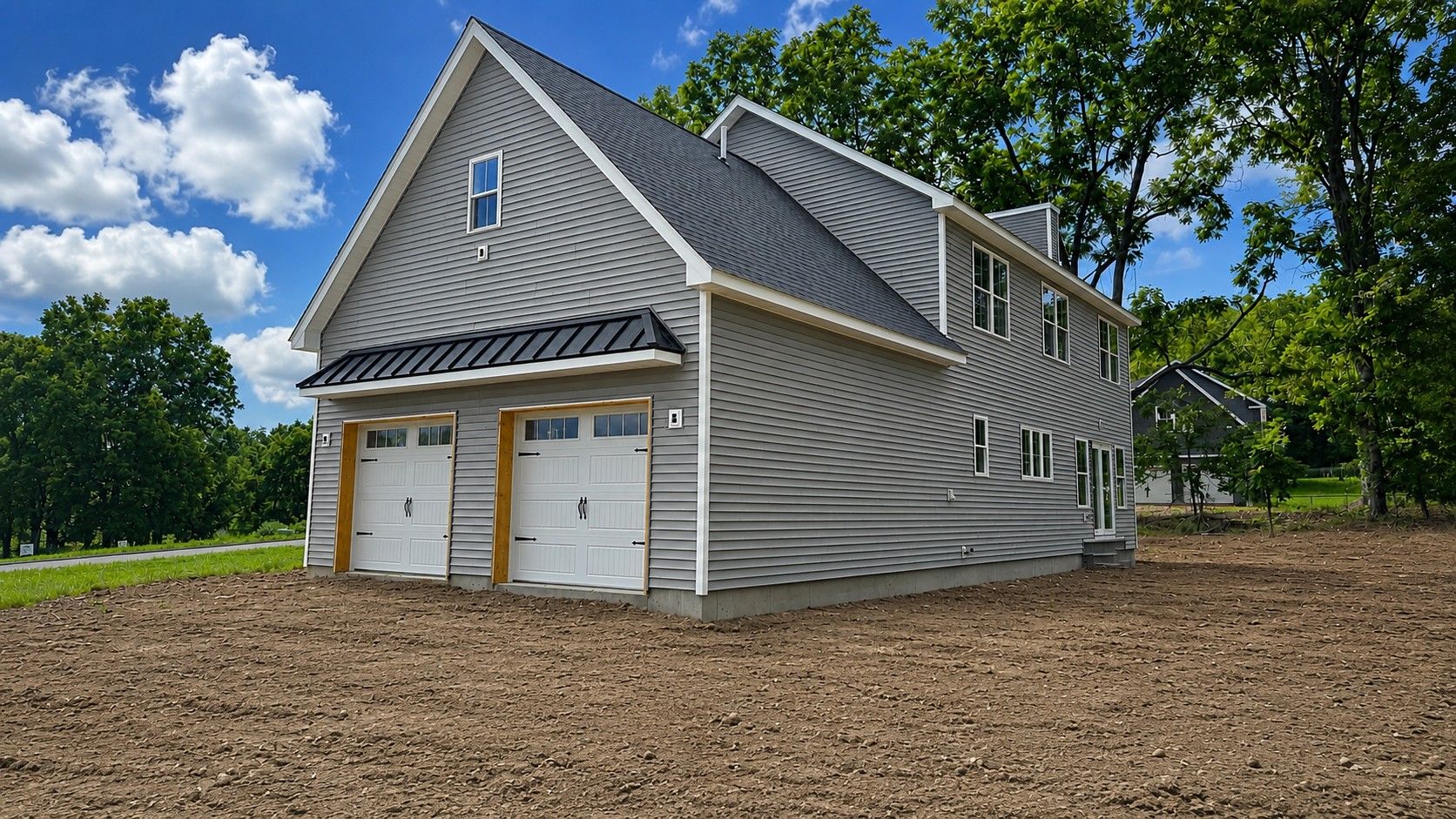 Construction Progress Photo of Side View Highlighting Garage Exterior